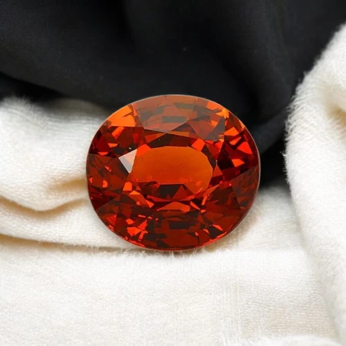 Hessonite (Gomed) stone on a velvet